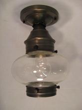  2024-AC-MED-CSG - Onion Flush No Cage Antique Copper Medium Base Socket Clear Seedy Glass